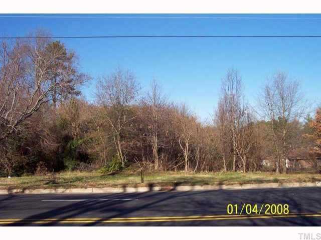 3029 Poole Road, Unit LO5 Raleigh, NC 27610 - Photo 1 of 3 a view of dirt field with trees