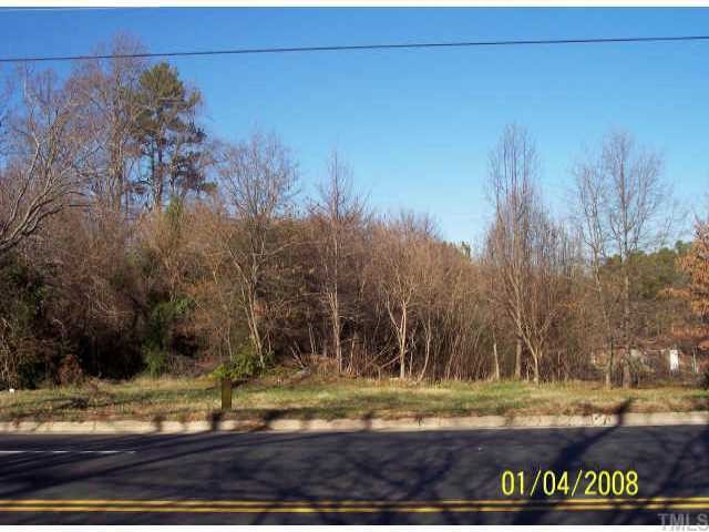 3029 Poole Road, Unit LO5 Raleigh, NC 27610 - Photo 3 of 3 a view of a yard with an tree