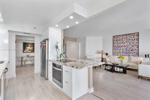 a kitchen with a stove and a sink