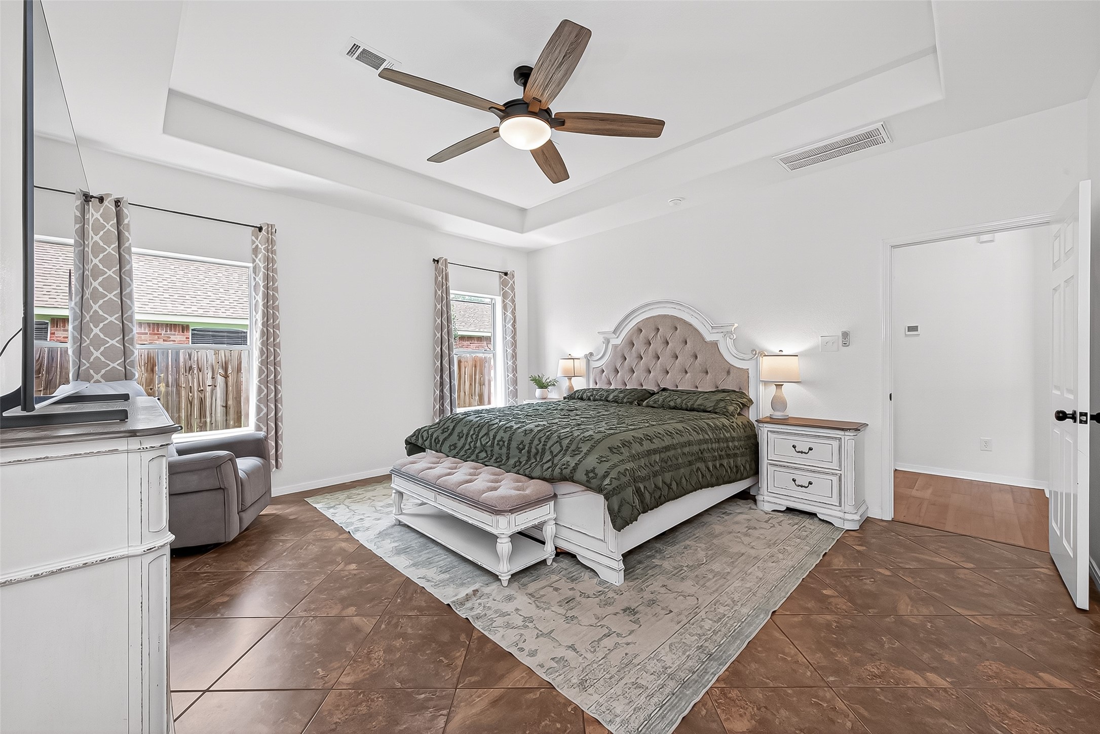 7411 Stonesfield Place Spring, TX 77389 - Photo 15 of 37 1st Floor - Primary Bedroom - High efficiency ceiling fans installed for maximum airflow and lower energy consumption.