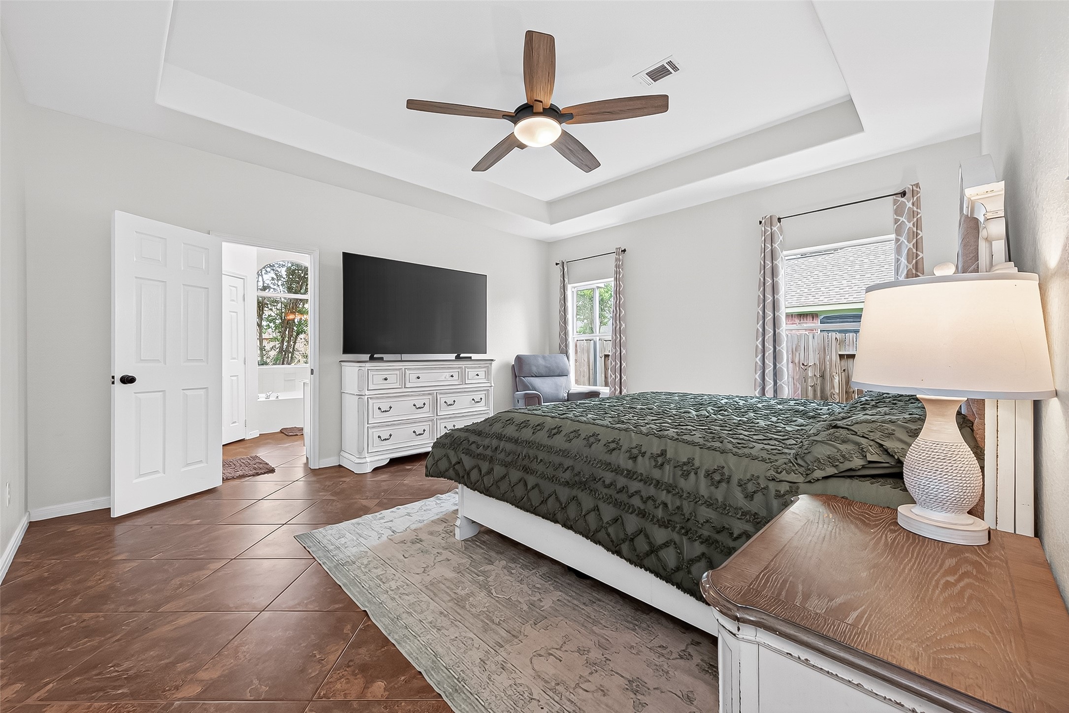 7411 Stonesfield Place Spring, TX 77389 - Photo 16 of 37 1st Floor - Primary Bedroom - Natural lighting