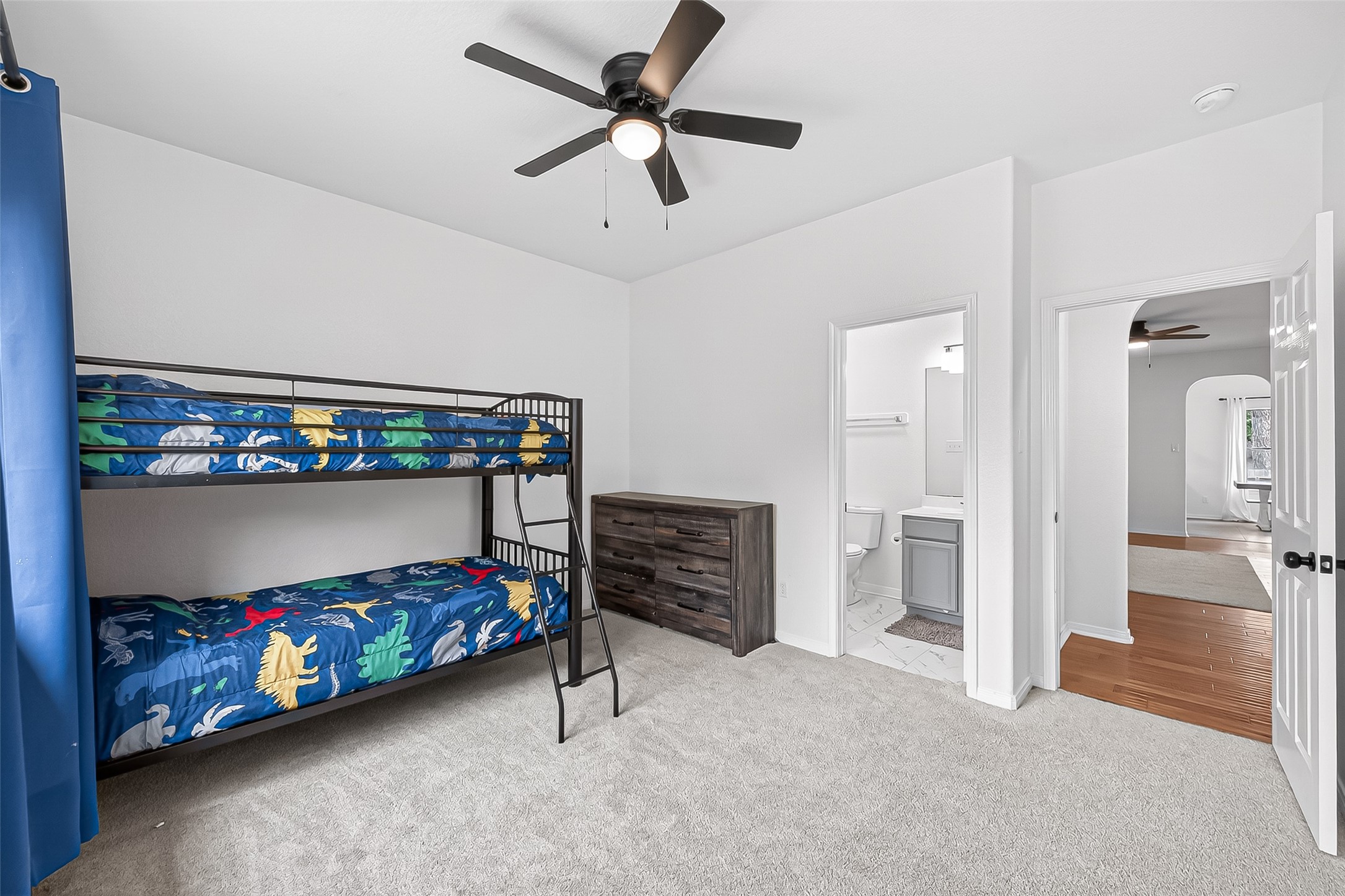 7411 Stonesfield Place Spring, TX 77389 - Photo 19 of 37 1st Floor - Jr. Primary Bedroom - This Jr. Primary provides convenience and flexibility for generational living.