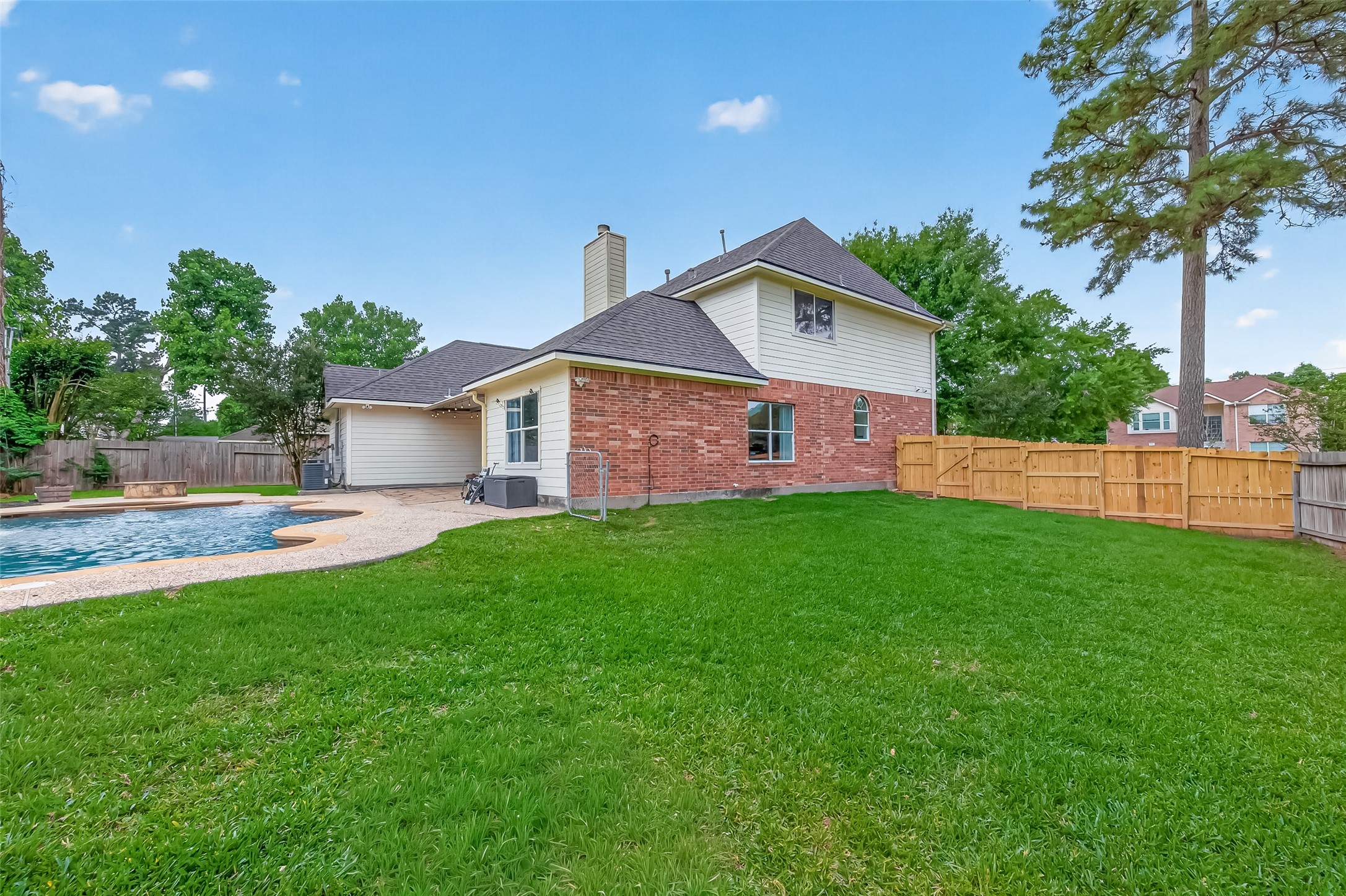 7411 Stonesfield Place Spring, TX 77389 - Photo 35 of 37 Huge yard - Property lot is 11,000 sq ft. This yards allow for games and lots out outdoor playtime with family and friends.