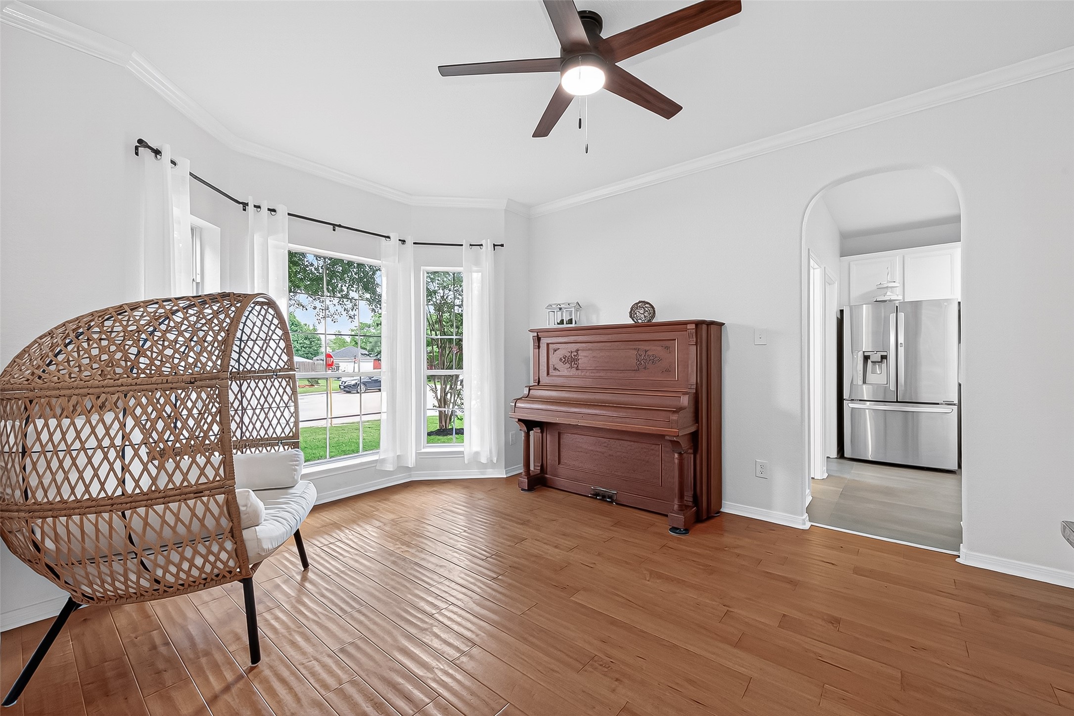 7411 Stonesfield Place Spring, TX 77389 - Photo 5 of 37 1st Floor - Formal dining room currently used as a piano lounge area, offering flexible use to suit your lifestyle.
