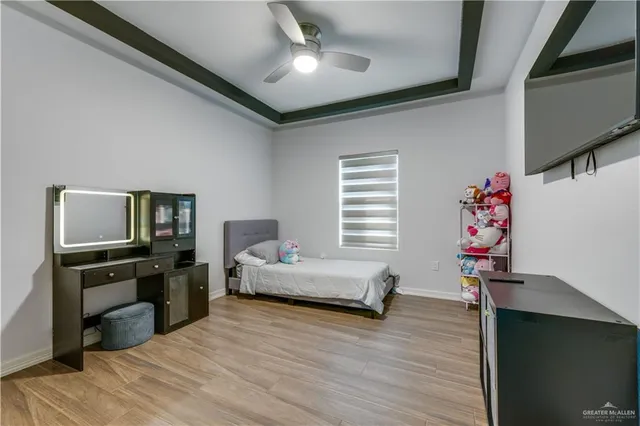 a bed room with a bed and furniture