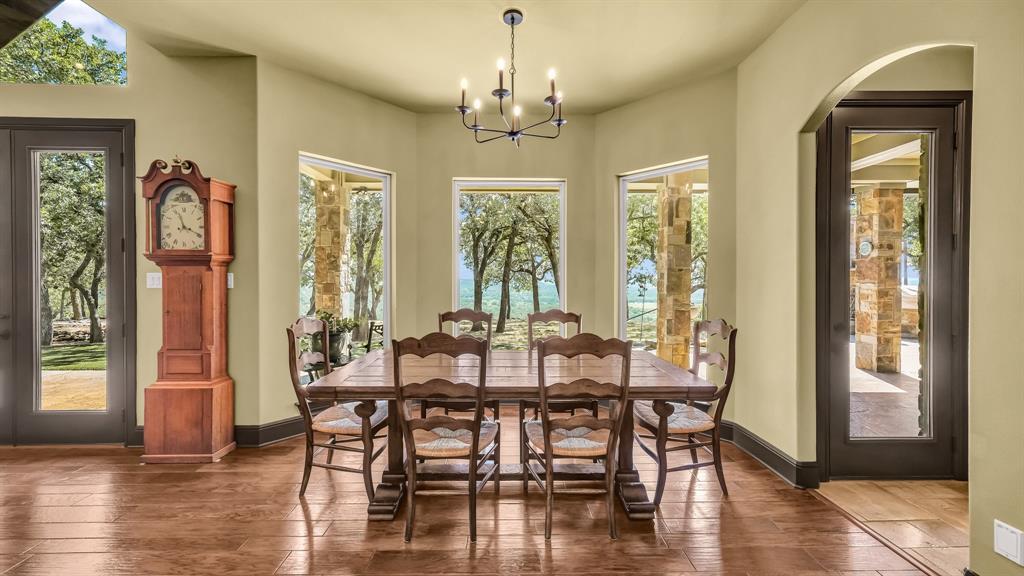 740 Post Oak Road Gordon, TX 76453 - Photo 14 of 40 a view of a dining room with furniture window and wooden floor