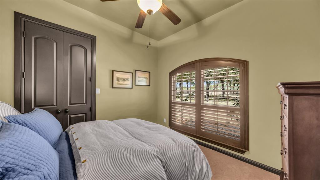 740 Post Oak Road Gordon, TX 76453 - Photo 19 of 40 a bedroom with a bed and a window
