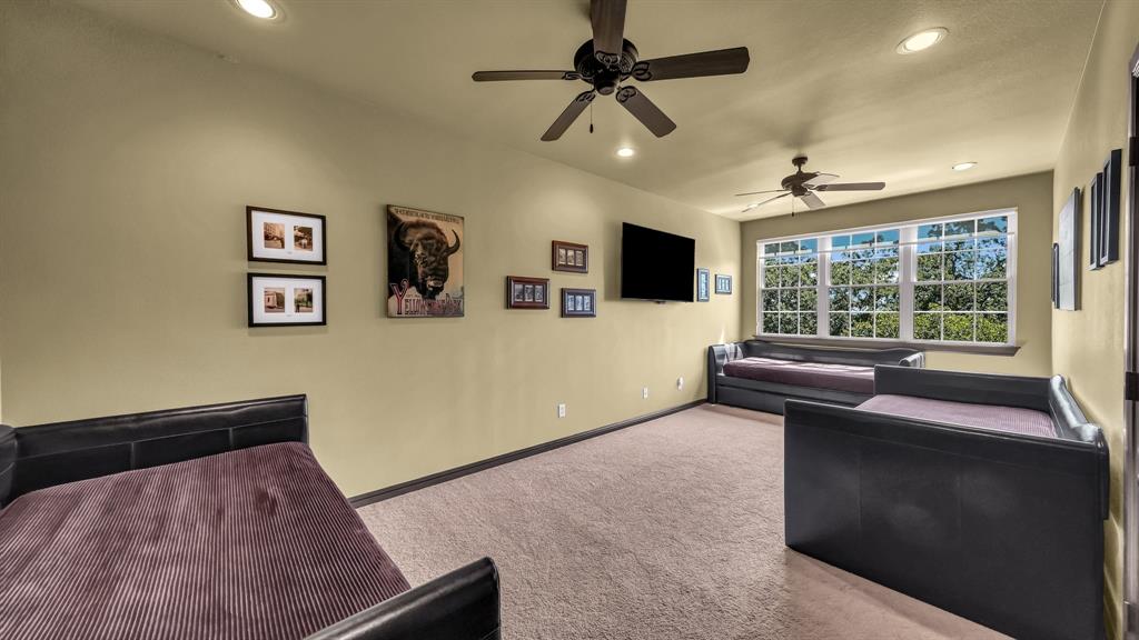 740 Post Oak Road Gordon, TX 76453 - Photo 22 of 40 a living room with furniture and a flat screen tv