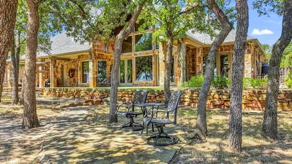 a view of house with outdoor seating space