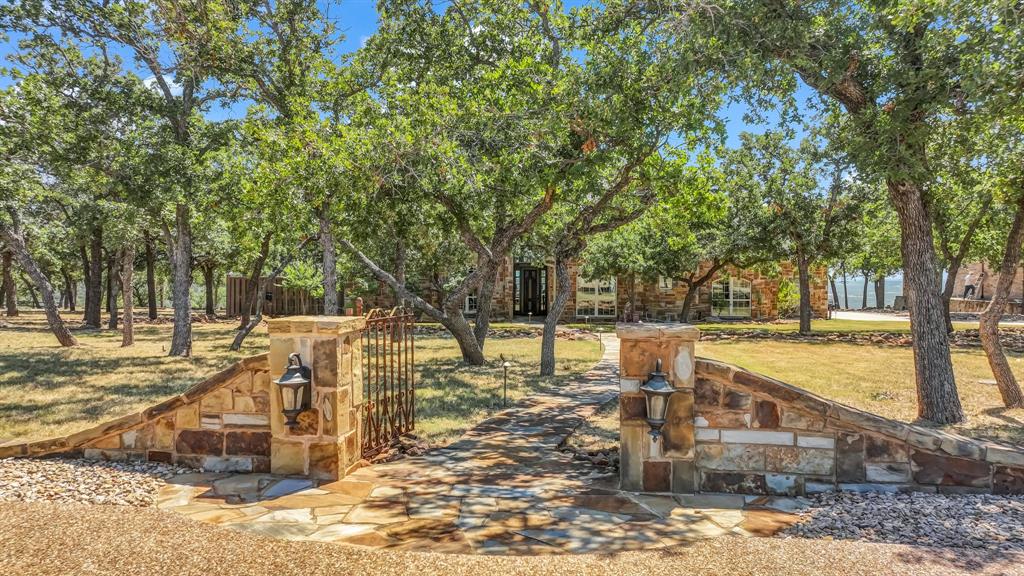 740 Post Oak Road Gordon, TX 76453 - Photo 4 of 40 a view of a swimming pool with a patio
