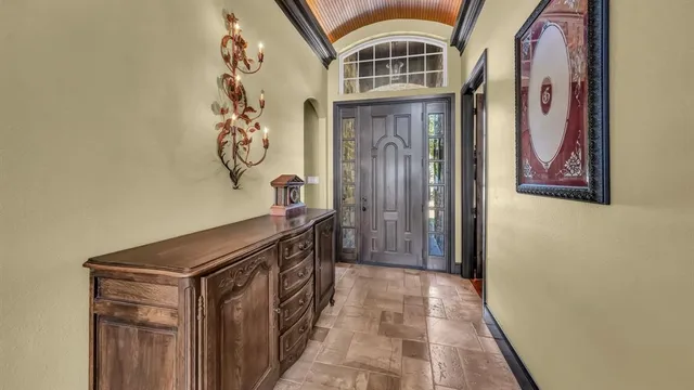 a view of entryway with a front door