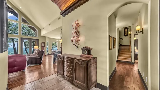 a view of living room with furniture and a fireplace