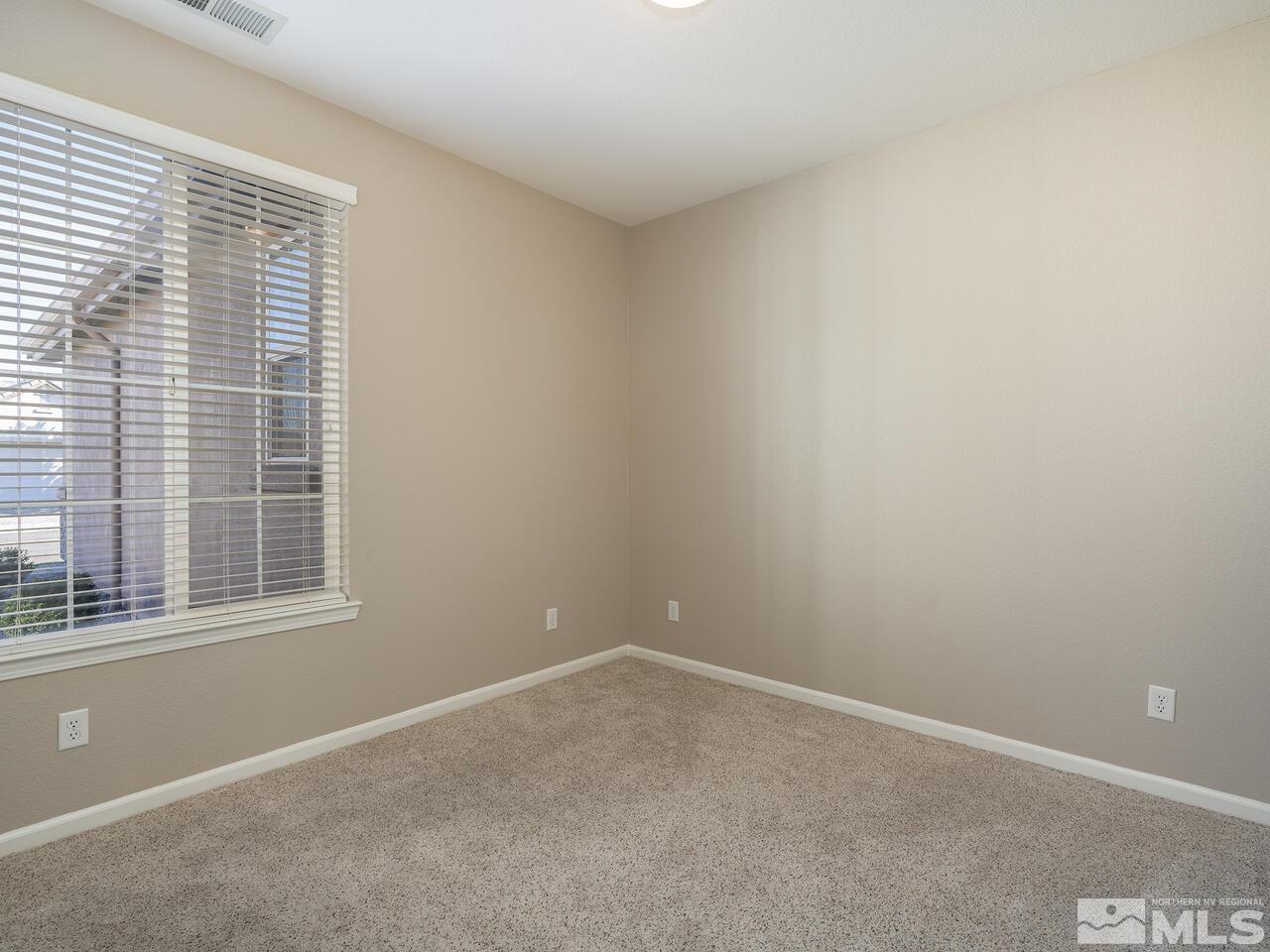 510 Magistrate Court Reno, NV 89521 - Photo 24 of 34 an empty room with a window