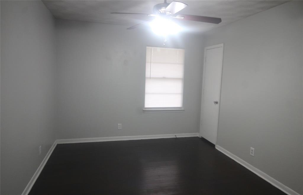 802 Sequoia Drive Lancaster, TX 75146 - Photo 8 of 13 an empty room with a window