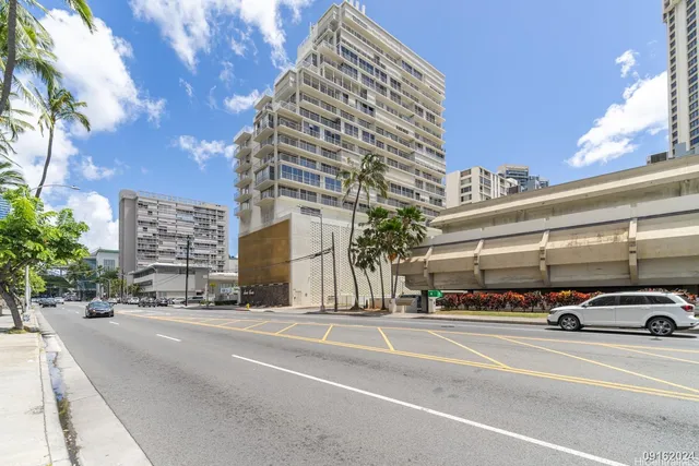 a view of a street with cars