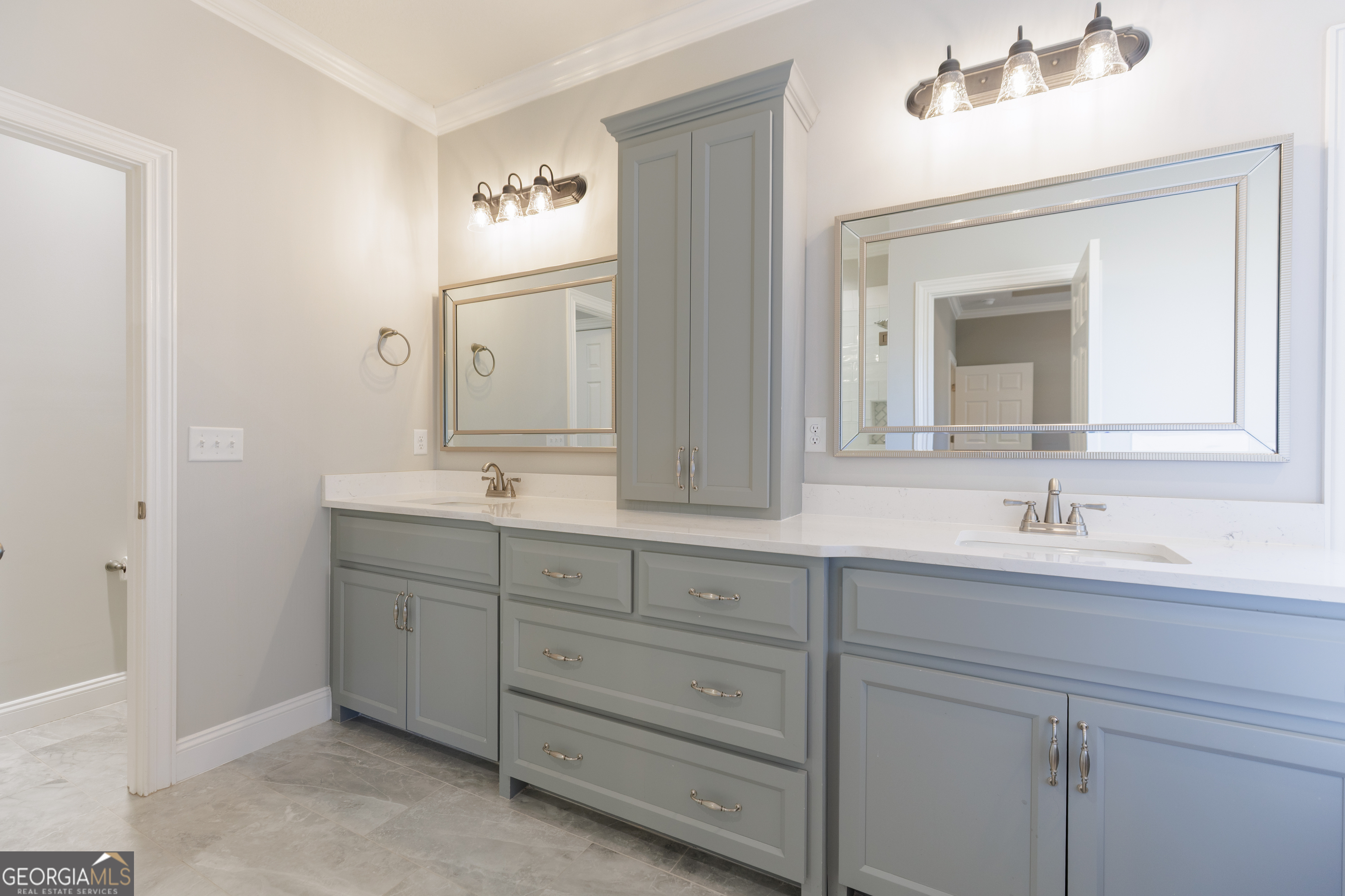 3001 Houser Way Hahira, GA 31632 - Photo 20 of 57 a bathroom with a sink double vanity and a mirror