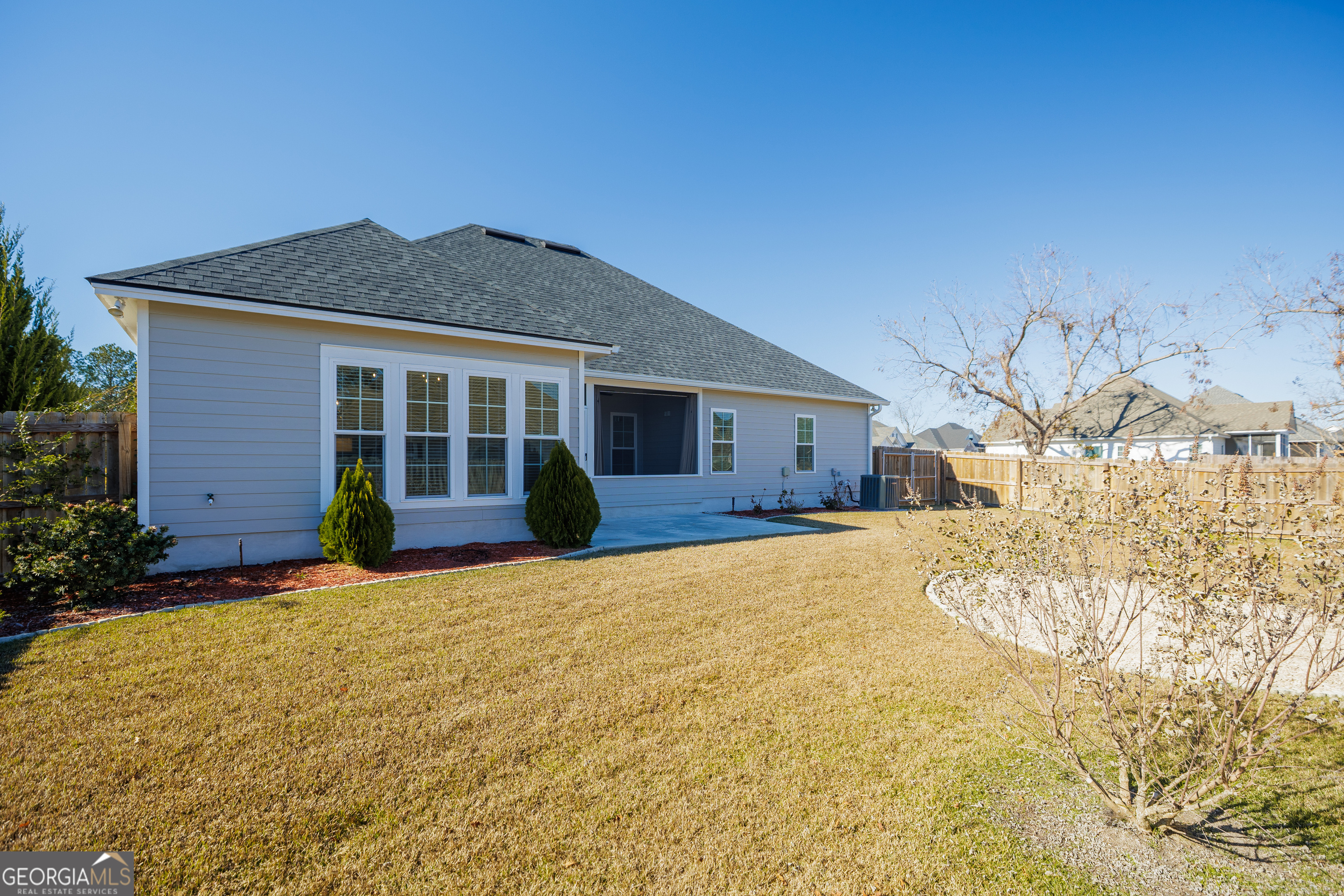 3001 Houser Way Hahira, GA 31632 - Photo 37 of 57 a front view of a house with a yard and garage