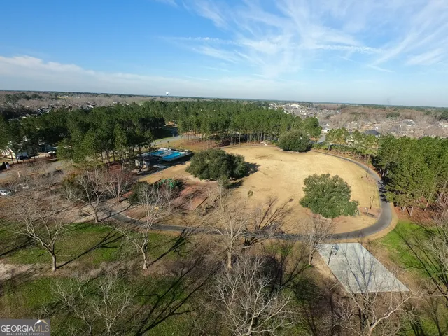 a view of a lake with trees