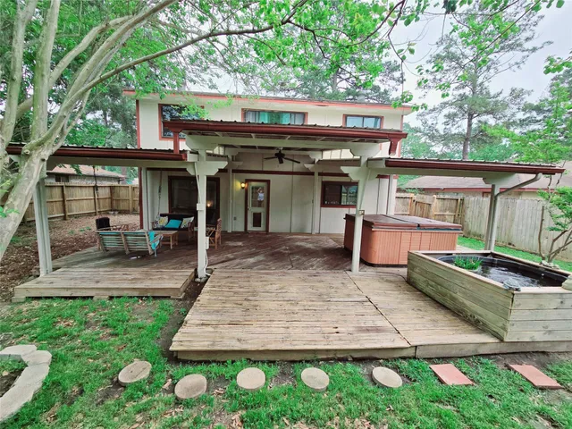 a view of a chairs and table in the patio