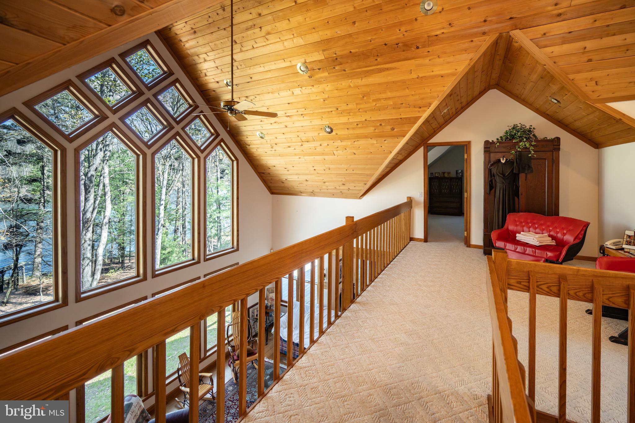 389 Sawmill Hollow Road Swanton, MD 21561 - Photo 26 of 62 a view of a two chairs in the balcony