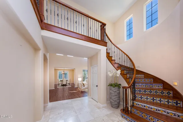 a kitchen with granite countertop a stove and a refrigerator