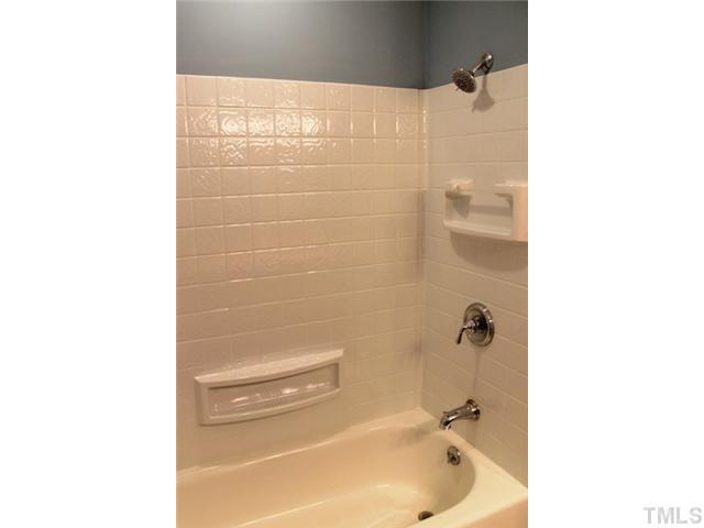 2301 Doran Place Raleigh, NC 27604 - Photo 9 of 11 a bathroom with a bathtub