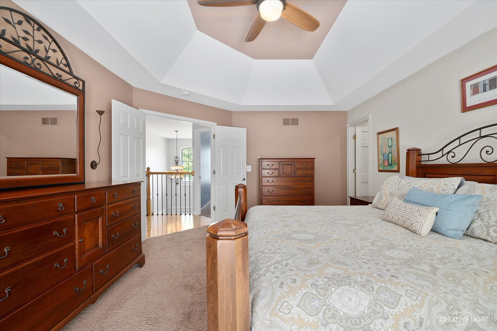 2636 Sweetbroom Road Naperville, IL 60564 - Photo 14 of 35 a large bedroom with a bed and a large mirror on the dresser
