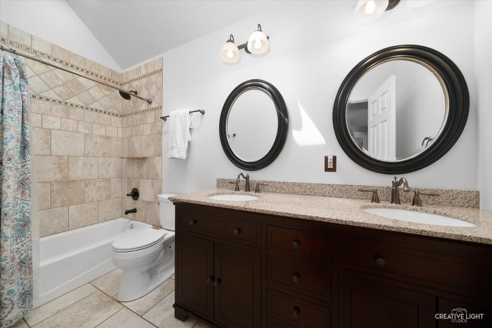 2636 Sweetbroom Road Naperville, IL 60564 - Photo 20 of 35 a bathroom with a double vanity sink a toilet and a bathtub