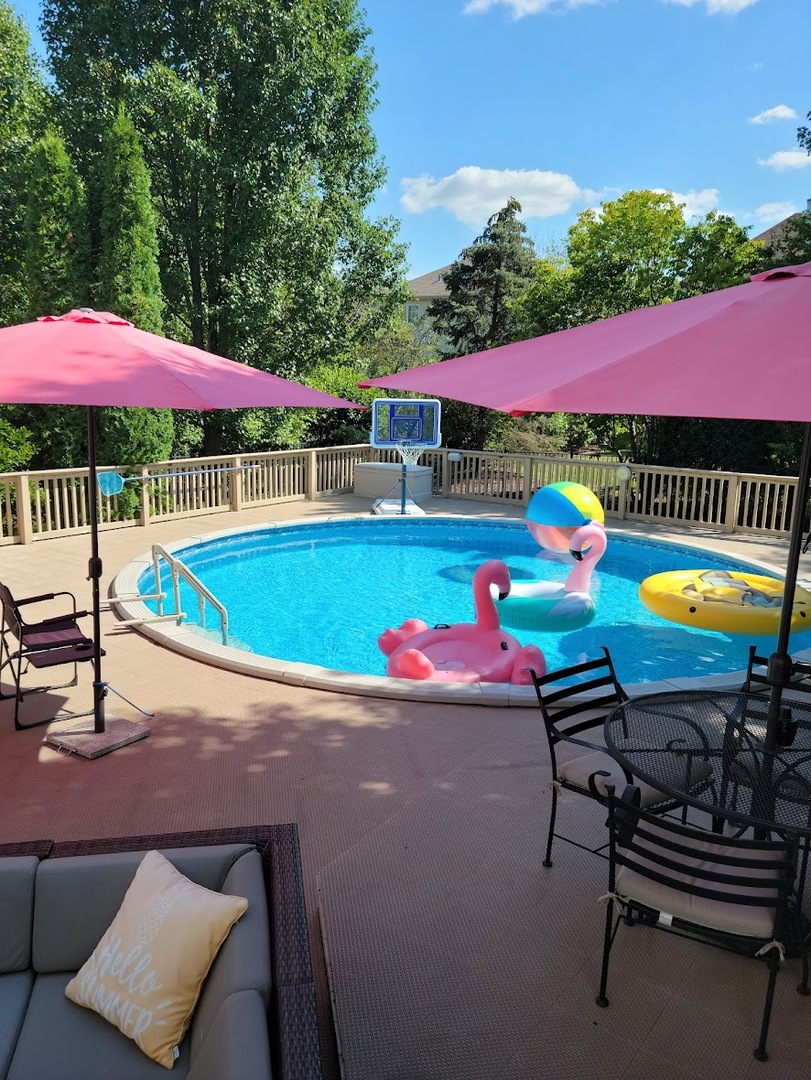 2636 Sweetbroom Road Naperville, IL 60564 - Photo 29 of 35 a view of a swimming pool with sitting area