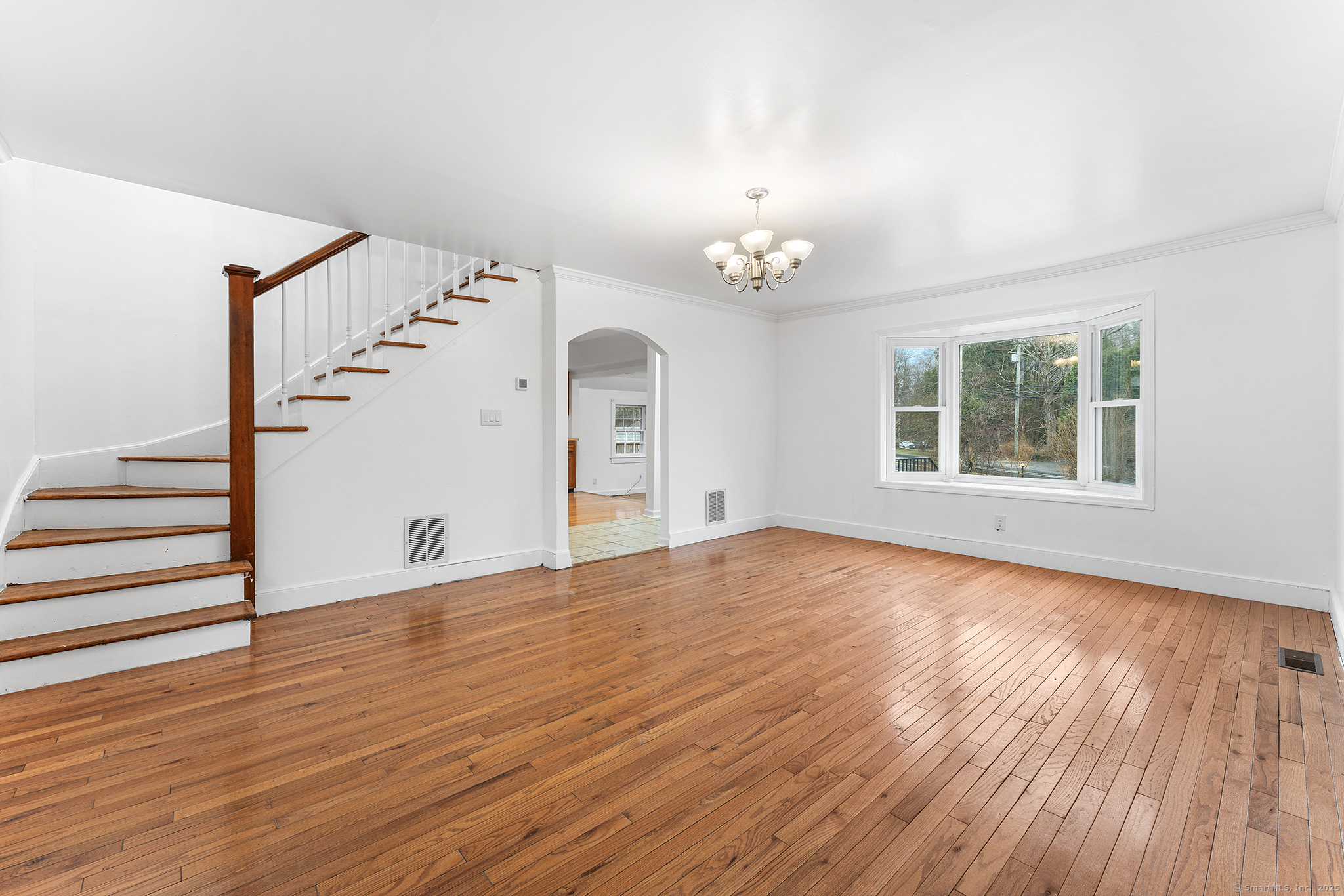 20 Georgetown Road Weston, CT 06883 - Photo 11 of 30 wooden floor in an empty room with a window