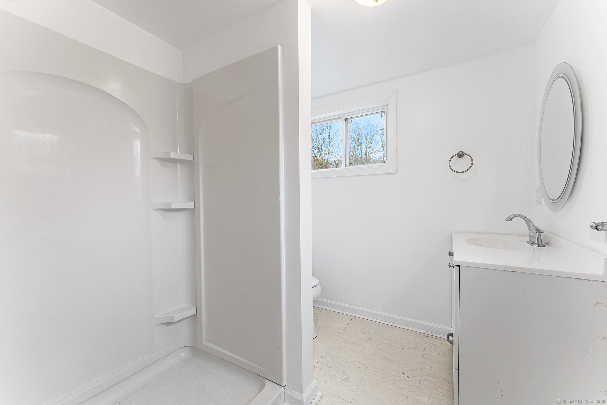 20 Georgetown Road Weston, CT 06883 - Photo 15 of 30 a bathroom with a sink and mirror