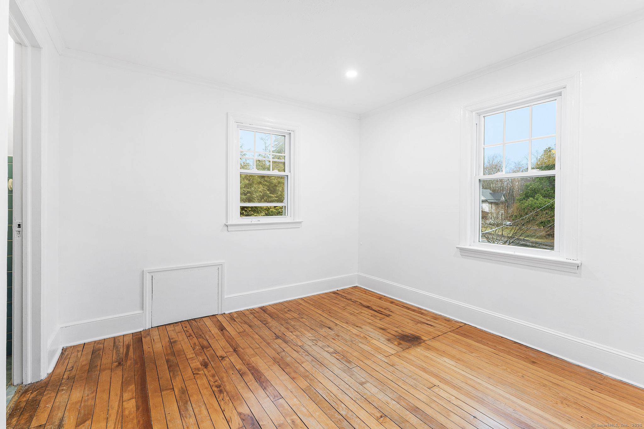 20 Georgetown Road Weston, CT 06883 - Photo 17 of 30 a view of empty room with wooden floor