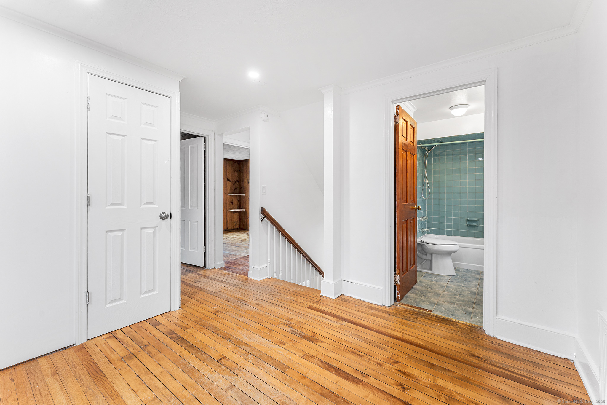 20 Georgetown Road Weston, CT 06883 - Photo 18 of 30 a view of a room with wooden floor and bathroom
