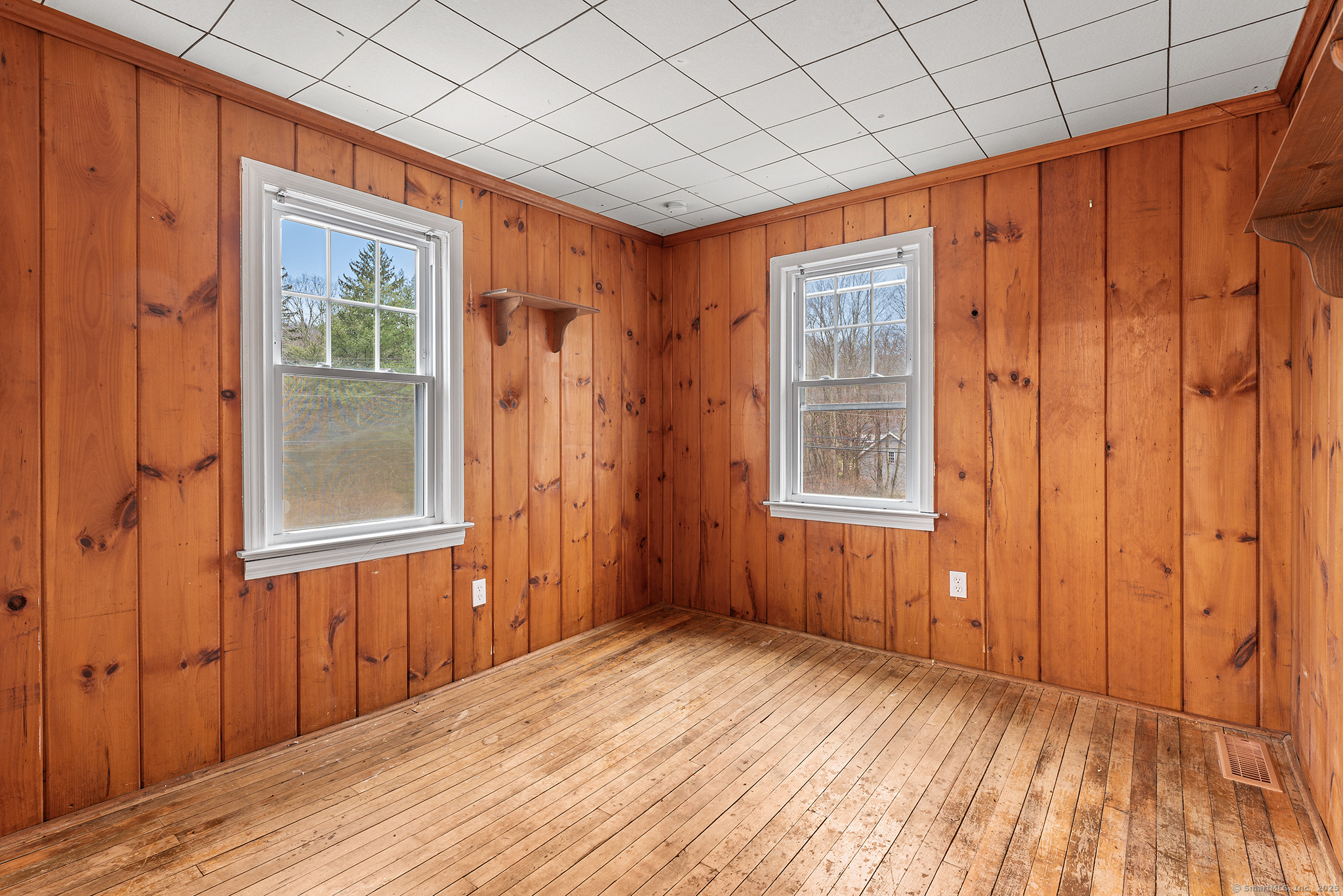 20 Georgetown Road Weston, CT 06883 - Photo 20 of 30 a view of a room with wooden floor and windows