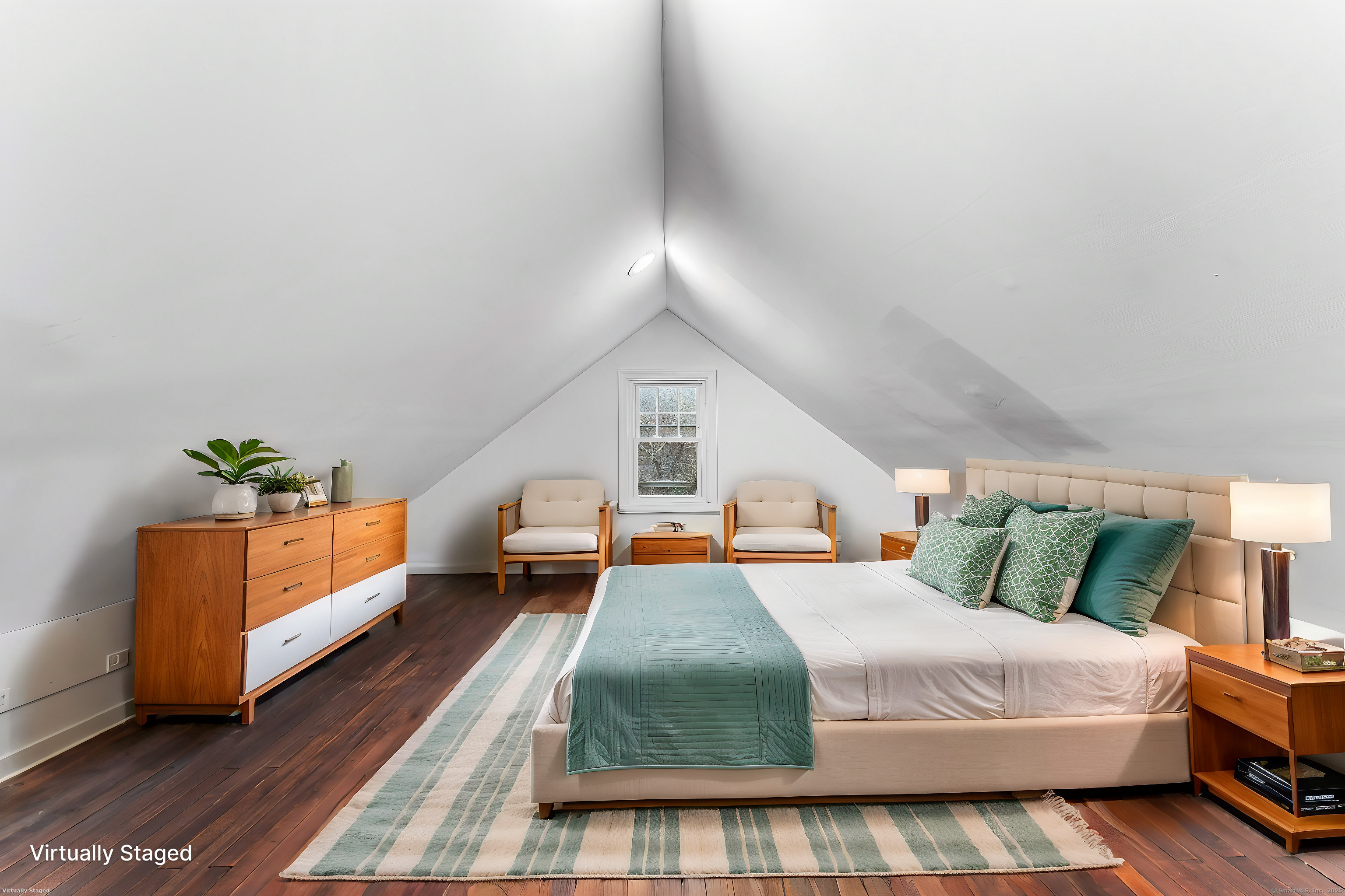 20 Georgetown Road Weston, CT 06883 - Photo 24 of 30 a bedroom with a bed and a couch