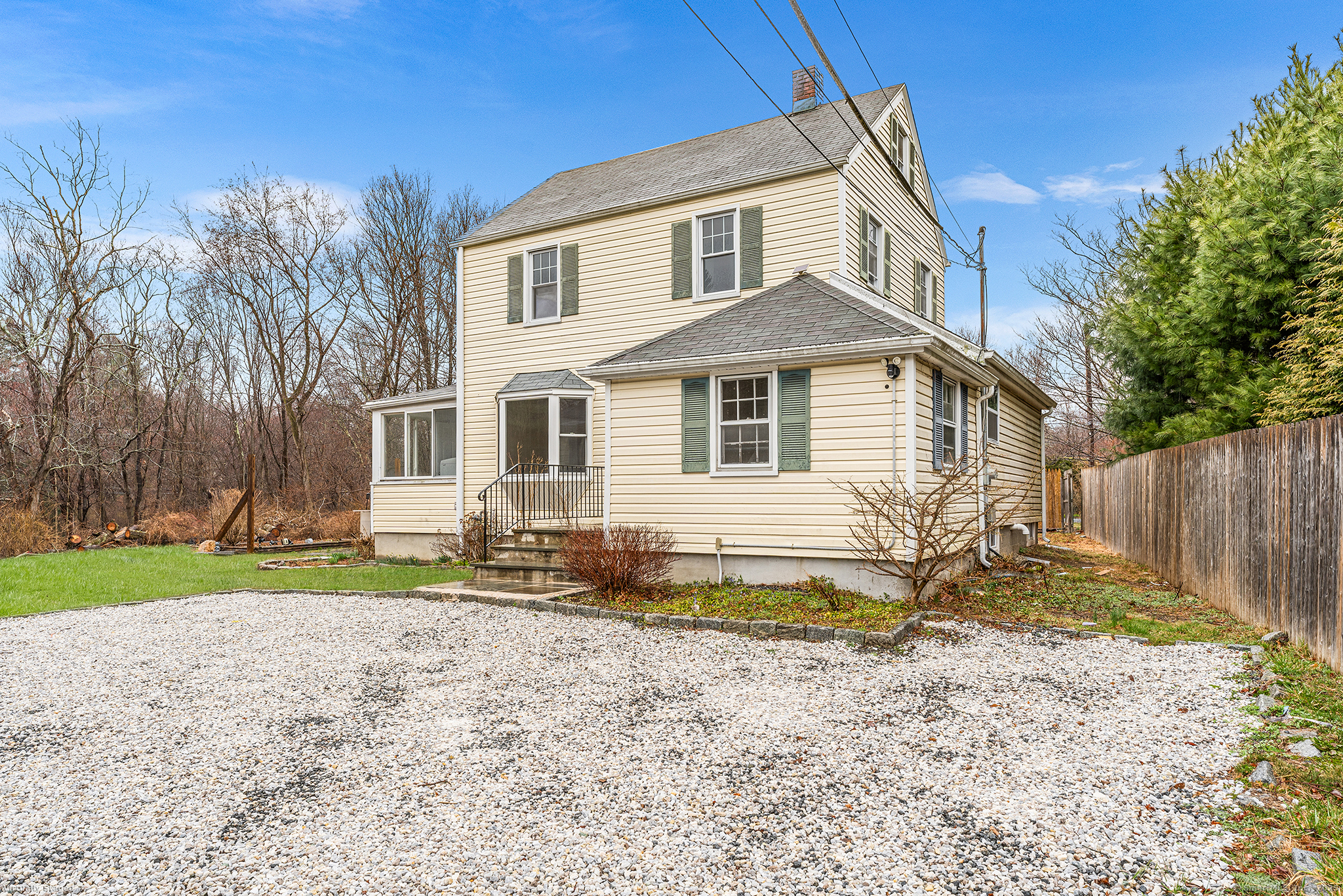 20 Georgetown Road Weston, CT 06883 - Photo 29 of 30 a front view of a house with a yard