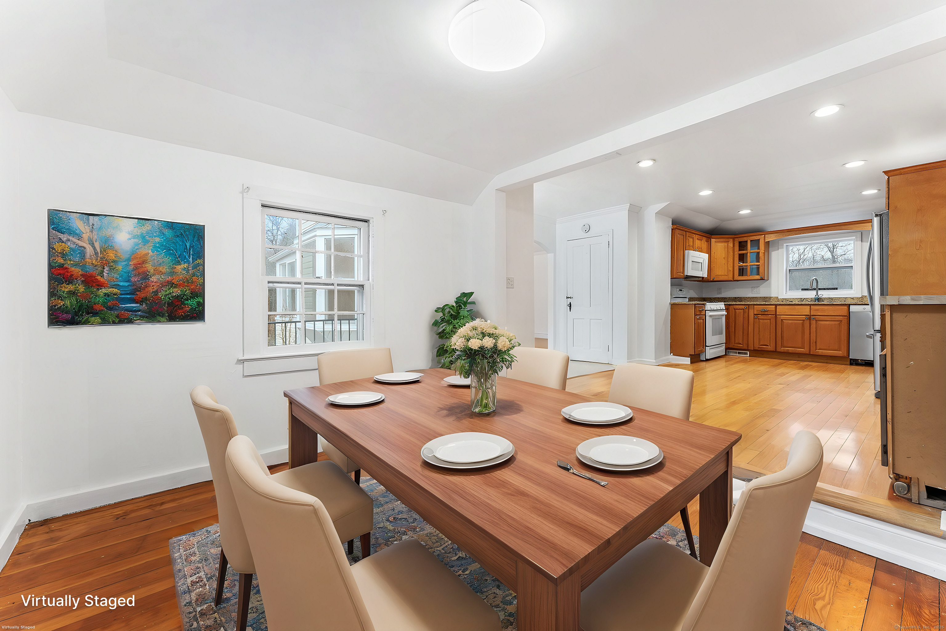 20 Georgetown Road Weston, CT 06883 - Photo 7 of 30 a view of a dining room with furniture and wooden floor