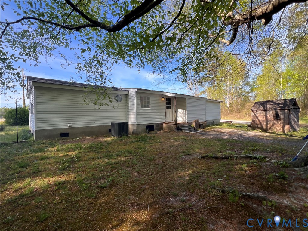 36210 Owens Grove Road Waverly, VA 23890 - Photo 2 of 24 a view of a house with a yard