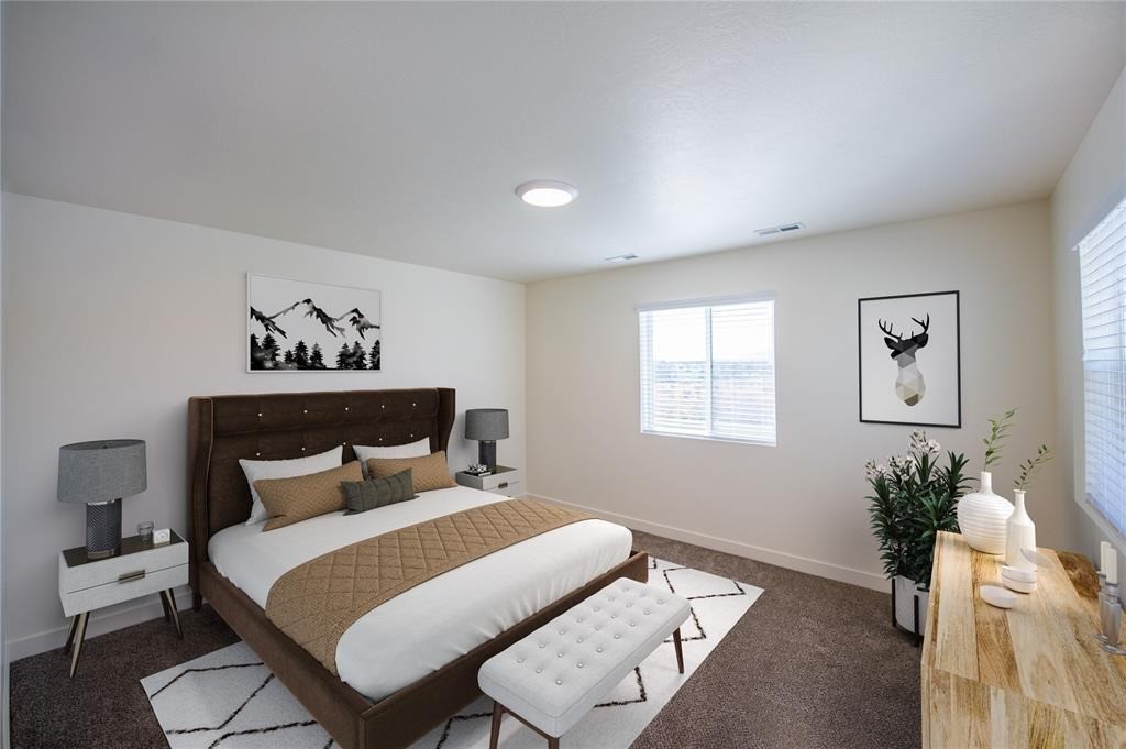 12603 Telge Road, Unit 7D Cypress, TX 77429 - Photo 6 of 19 a bedroom with a bed and a table