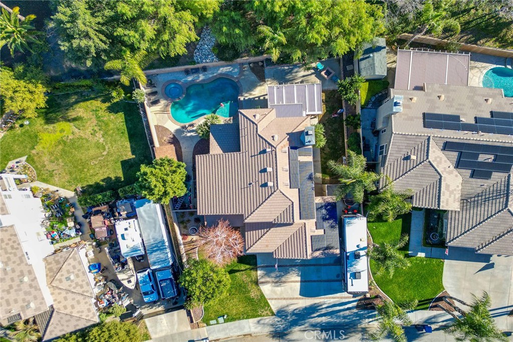 36232 Village Road Yucaipa, CA 92399 - Photo 33 of 34 an aerial view of a house with swimming pool and garden