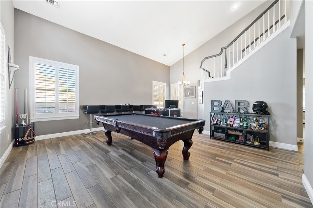 36232 Village Road Yucaipa, CA 92399 - Photo 7 of 34 a living room with furniture and a wooden floor