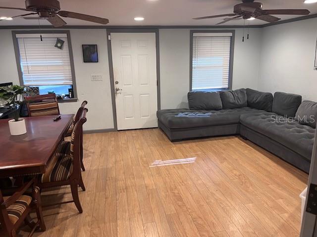 888 Longdale Avenue Longwood, FL 32750 - Photo 4 of 17 a living room with furniture and a wooden floor
