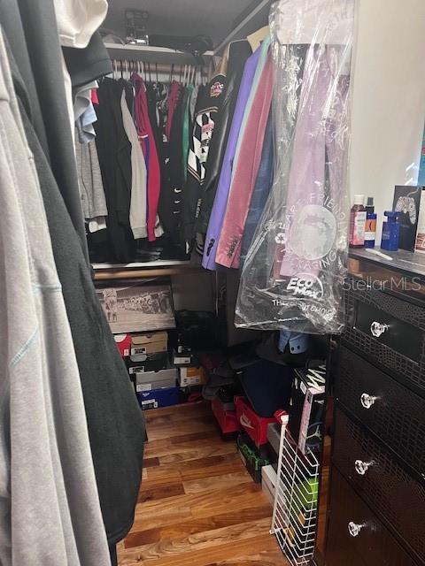 888 Longdale Avenue Longwood, FL 32750 - Photo 9 of 17 a view of walk in closet with clothes