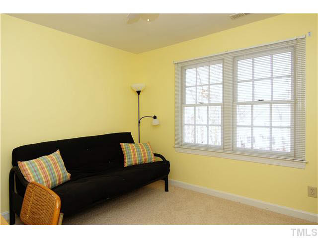 7017 Spring Ridge Road Cary, NC 27518 - Photo 21 of 25 The 4th upstairs BR currently used as a convenient home office! Bedroom