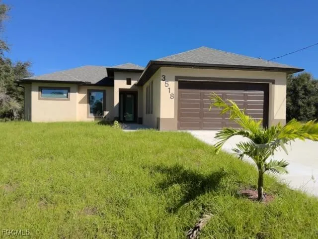 a house view with a garden space