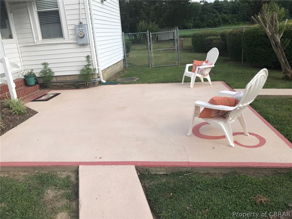 515 Stormont Road Saluda, VA 23149 - Photo 22 of 25 Rear patio to enjoy evening cocktails or morning coffee.