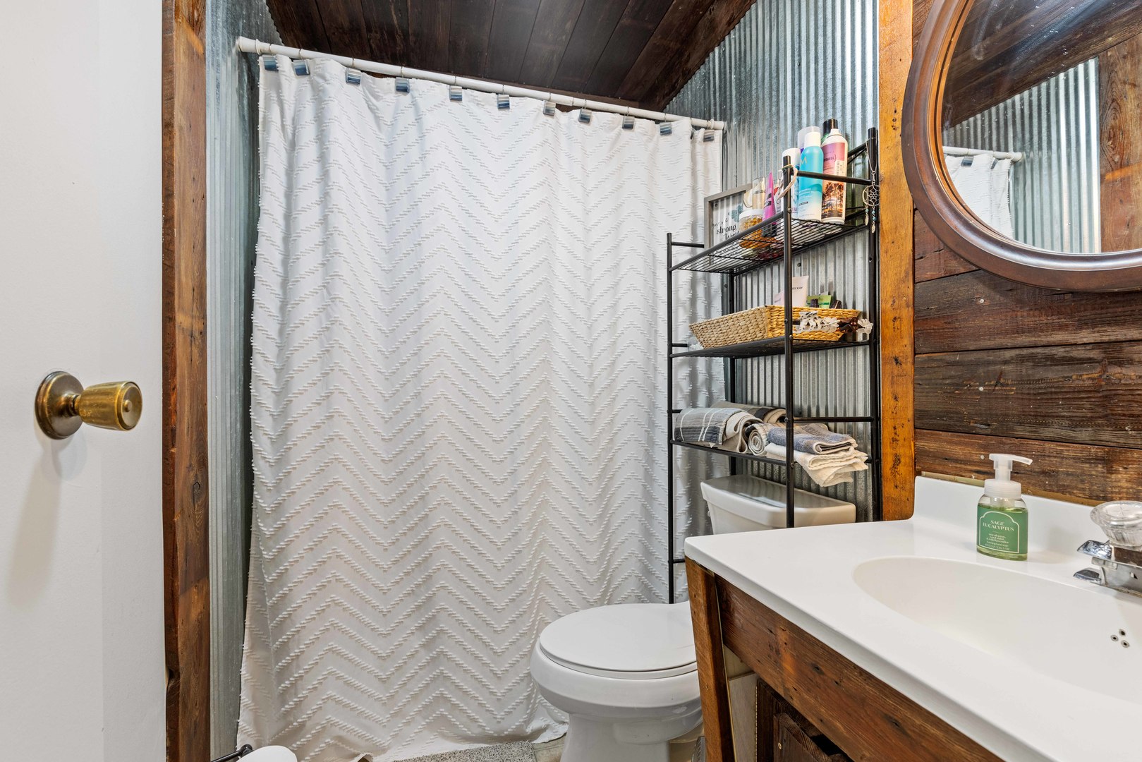 1500 South Kings Road Kings, IL 61068 - Photo 16 of 34 a bathroom with a sink a toilet and a shower curtain