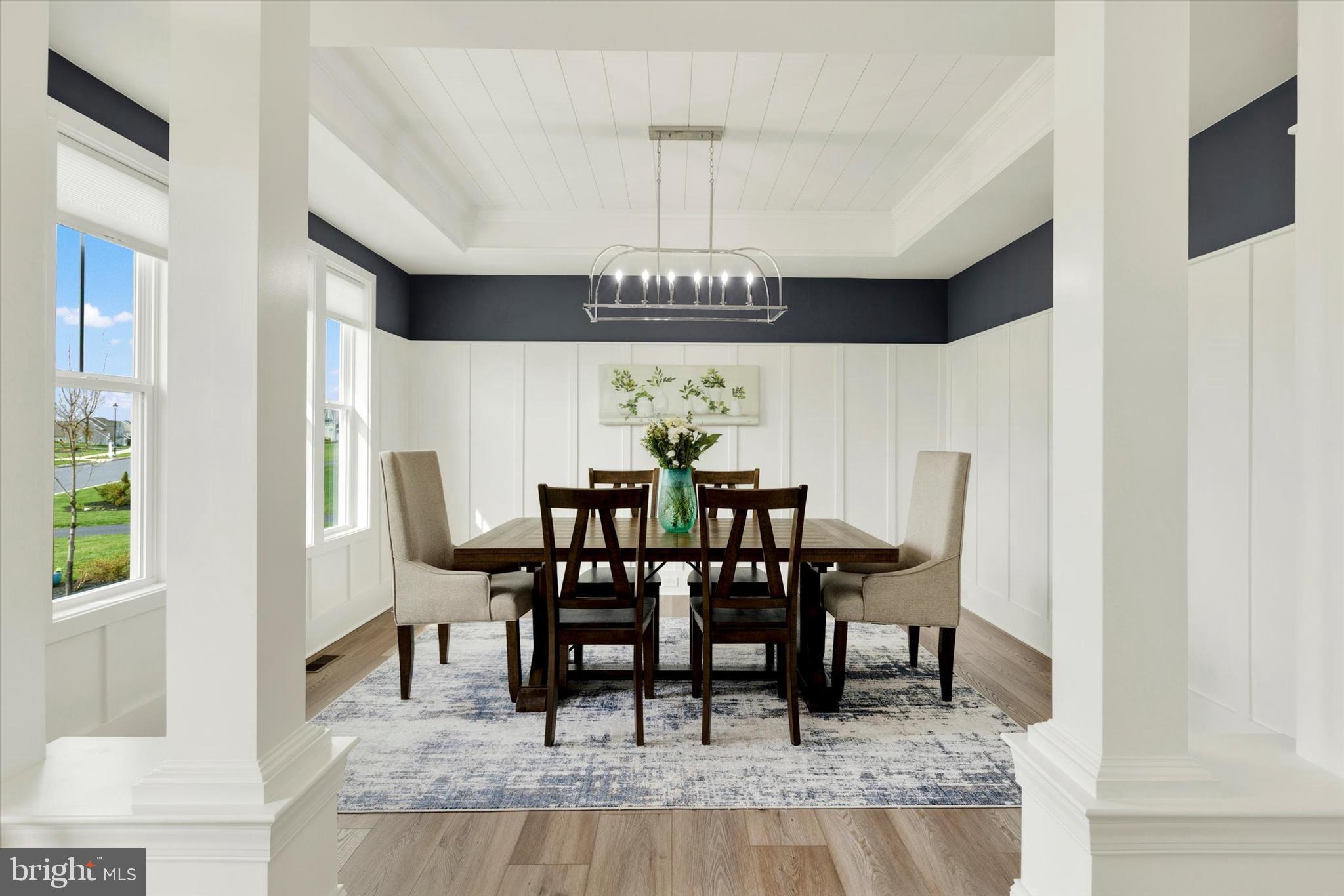 1033 Lititz Bend Drive Lititz, PA 17543 - Photo 7 of 58 a view of a dining room with furniture and chandelier