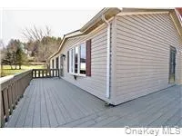 a view of a house with a deck