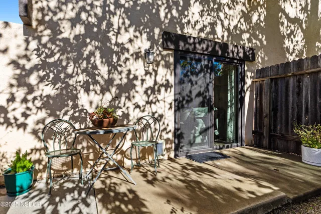 a view of a backyard of the house